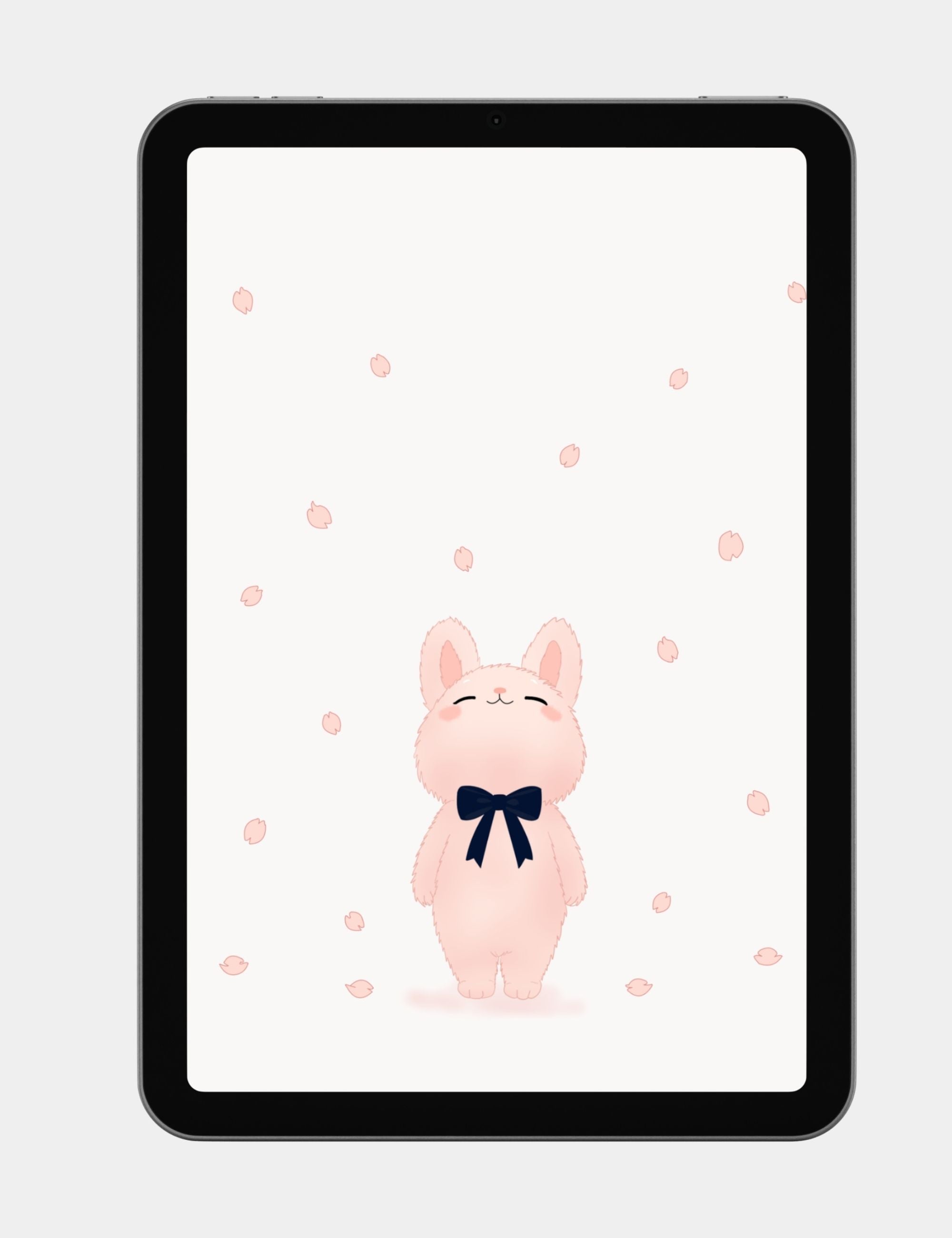 Cute pastel bunny tablet wallpaper with cherry blossom petals, navy ribbon, and soft cream background.